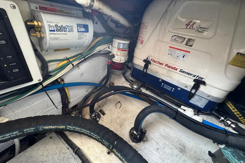 Mary Time Yacht Photos Pics Engine room of a 2013 Back Cove 30 with Fischer Panda generator and ProMariner isolator.