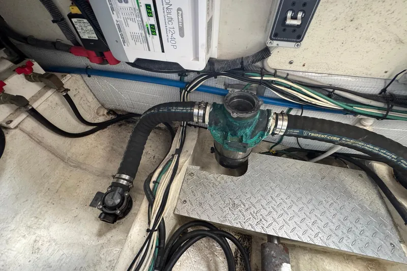 Mary Time Yacht Photos Pics Engine compartment of a 2013 Back Cove 30 boat, showing wiring and plumbing components.