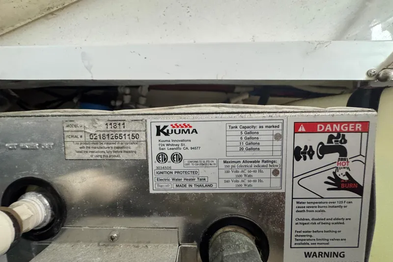 Mary Time Yacht Photos Pics Kuuma electric water heater label on 2013 Back Cove 30 boat, showing model and safety warnings.