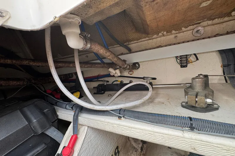 Mary Time Yacht Photos Pics 2013 Back Cove 30 engine compartment with visible wiring and plumbing components.