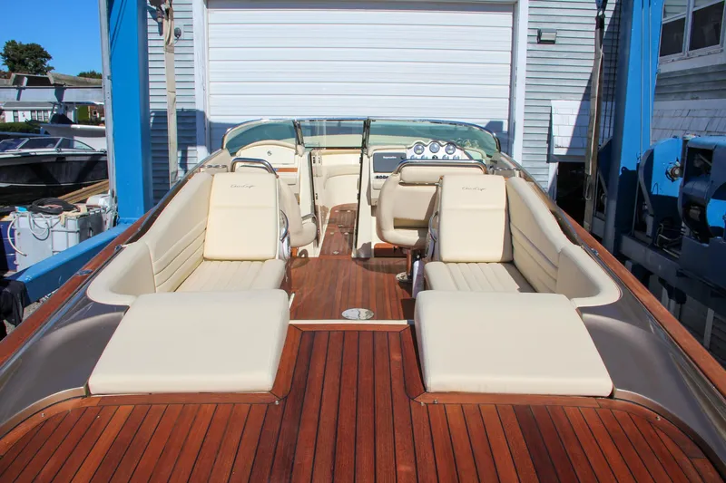  Yacht Photos Pics 2013 Chris-Craft Launch 32 with elegant teak deck and luxurious seating.