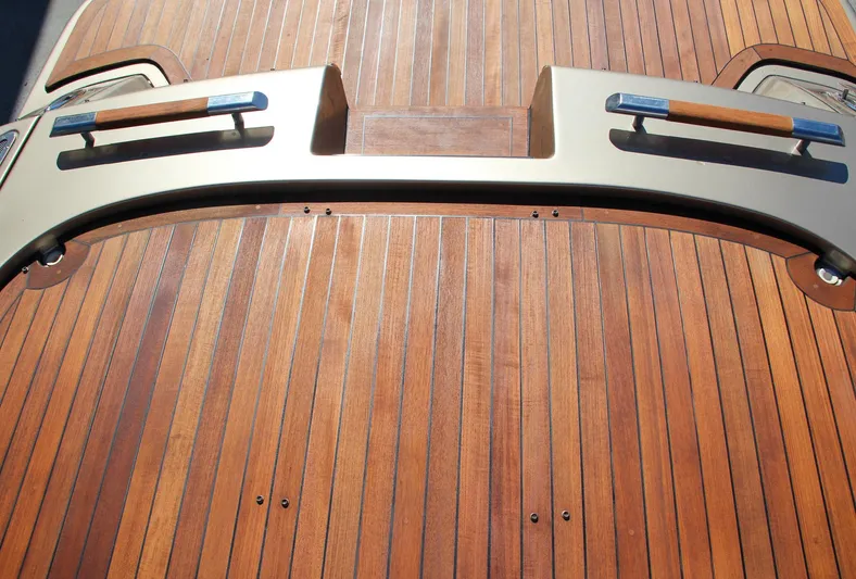  Yacht Photos Pics Teak deck of 2013 Chris-Craft Launch 32 boat, showcasing elegant wood finish.