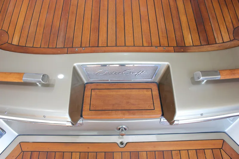  Yacht Photos Pics 2013 Chris-Craft Launch 32 boat deck with teak wood finish and branded detailing.