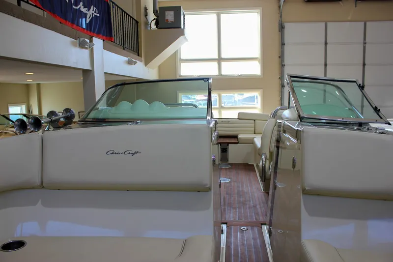  Yacht Photos Pics 2013 Chris-Craft Launch 32 interior with elegant seating and wooden flooring.