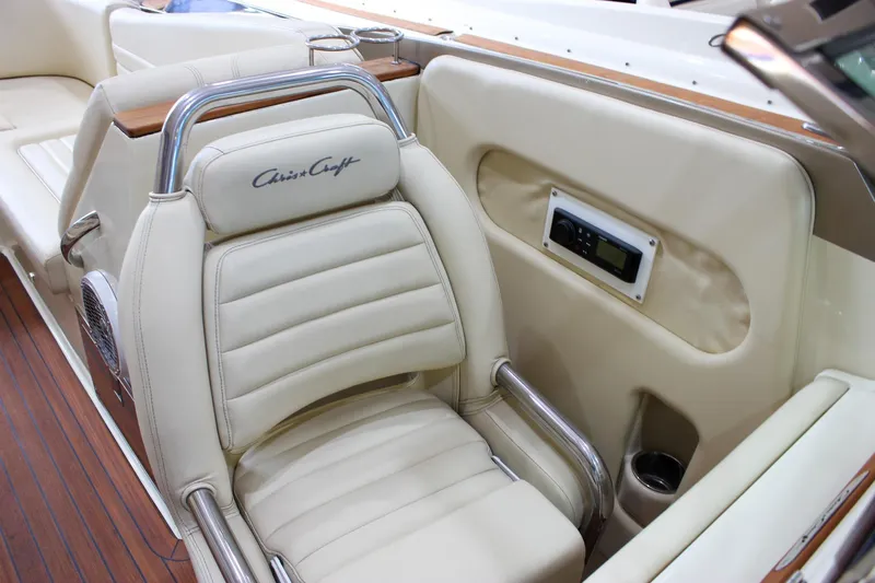  Yacht Photos Pics Luxurious interior of 2013 Chris-Craft Launch 32 boat with cream leather seating.