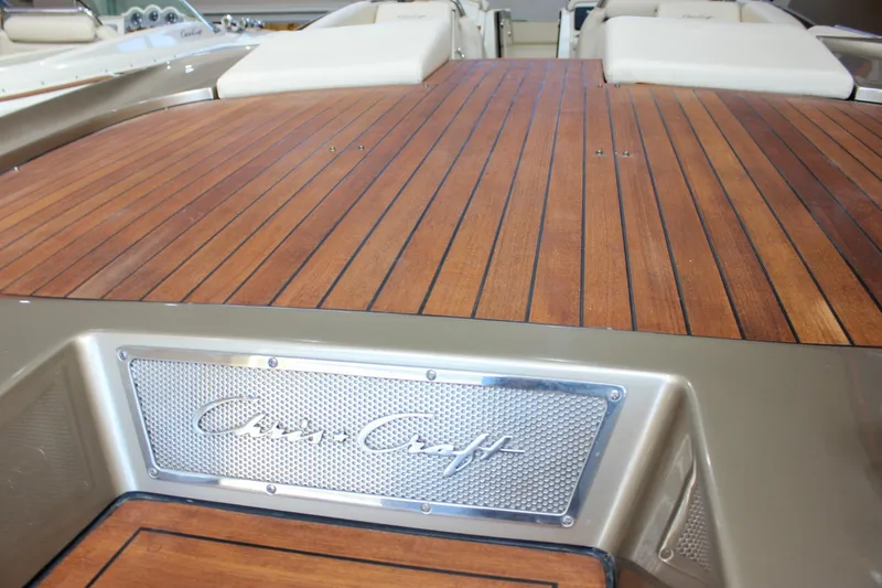  Yacht Photos Pics 2013 Chris-Craft Launch 32 boat with teak deck and branded metal plate.