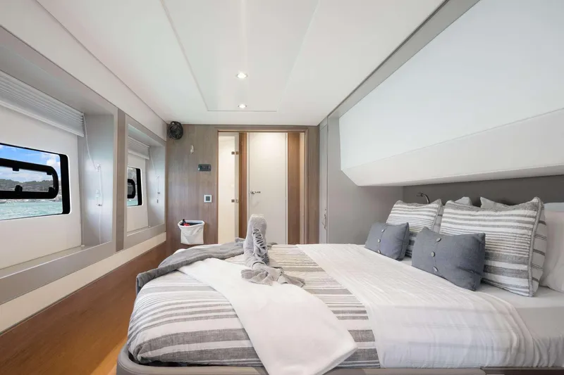  Yacht Photos Pics Luxurious bedroom interior on 2023 Bali 5.4 yacht, featuring modern design and comfortable bedding.