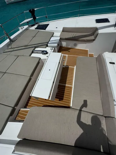  Yacht Photos Pics Luxury Bali 5.4 yacht deck with sun loungers and teak flooring, 2023 model.