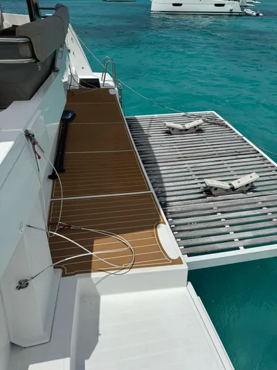  Yacht Photos Pics 2023 Bali 5.4 yacht deck with turquoise water background.