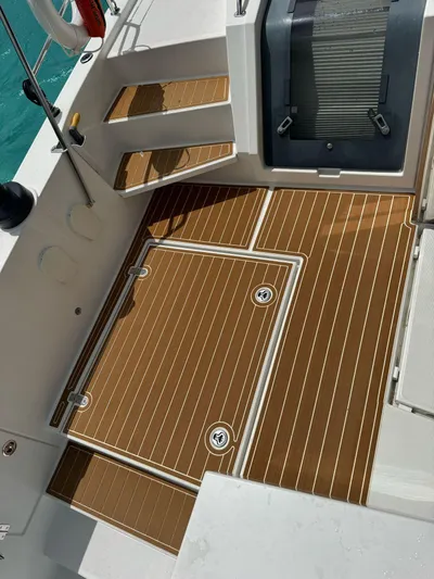  Yacht Photos Pics Bali 5.4 yacht deck, 2023 model, featuring teak flooring and modern design elements.