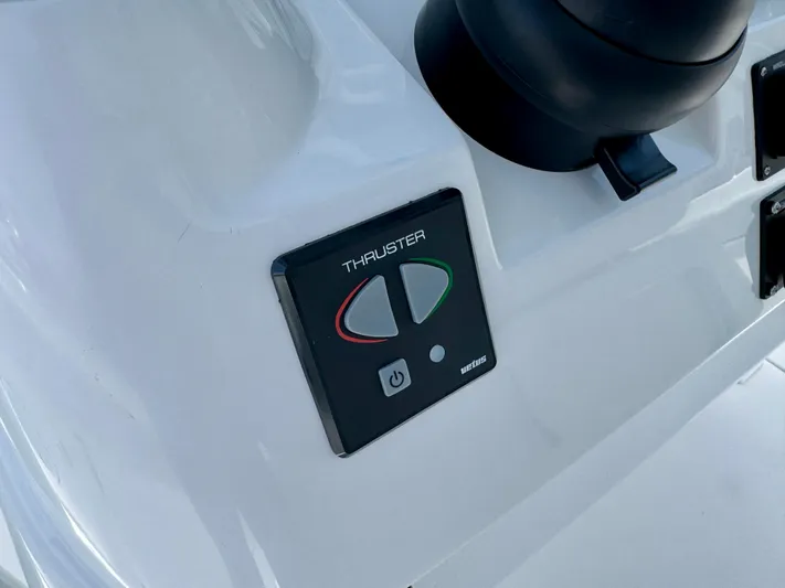  Yacht Photos Pics Control panel of 2025 Intrepid 345 Nomad FE boat, featuring thruster controls.