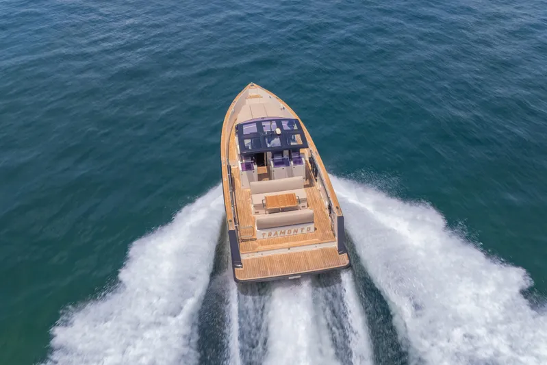 Tramonto Yacht Photos Pics 2021 Fjord 40 Open yacht cruising on open sea, aerial view.