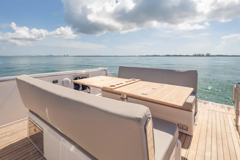 Tramonto Yacht Photos Pics Luxury seating area on 2021 Fjord 40 Open yacht with ocean view.