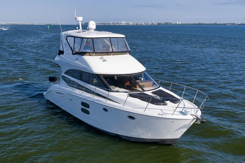  Yacht Photos Pics 2012 Meridian 441 Sedan yacht cruising on open water.