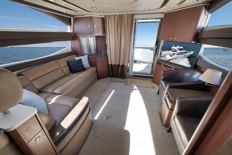  Yacht Photos Pics Luxurious interior of 2012 Meridian 441 Sedan yacht with leather seating and ocean view.