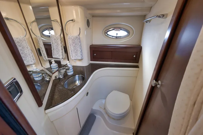  Yacht Photos Pics Luxurious bathroom in 2012 Meridian 441 Sedan yacht with modern fixtures.