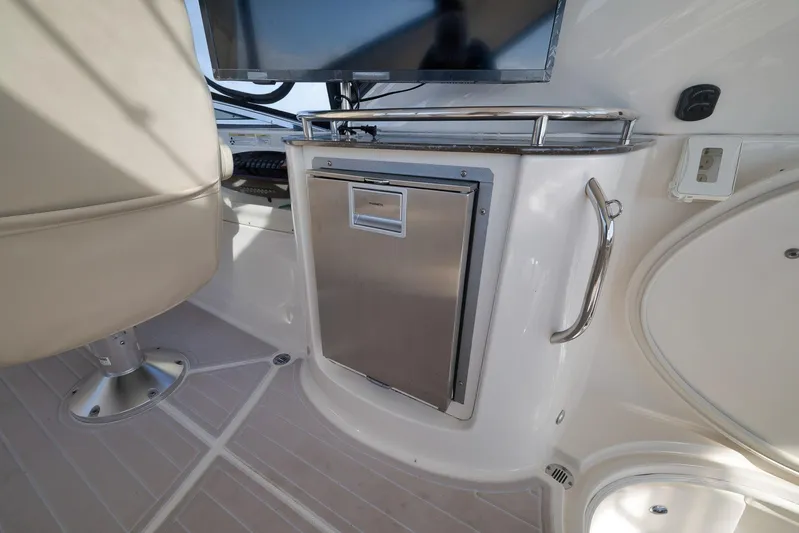  Yacht Photos Pics Interior of 2012 Meridian 441 Sedan yacht with seating and stainless steel cabinet.
