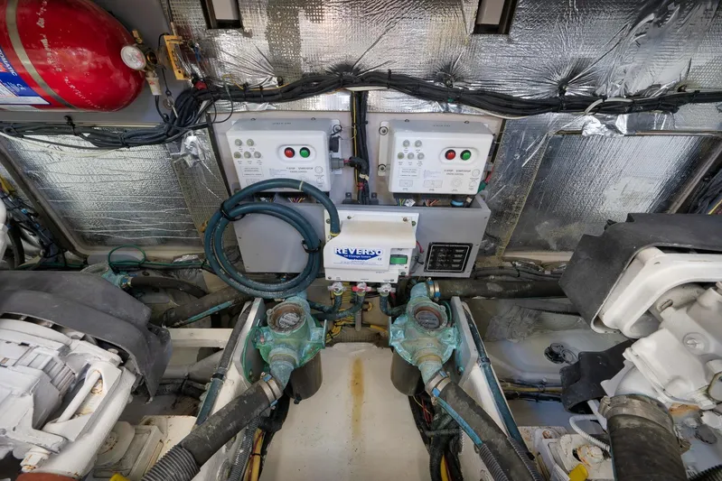  Yacht Photos Pics Engine room of a 2012 Meridian 441 Sedan with control panels and wiring.