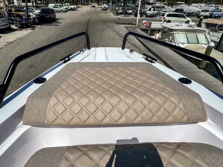  Yacht Photos Pics 2025 Axopar 37XC CROSS CABIN BRABUS Trim with diamond-stitched seating, docked at marina.