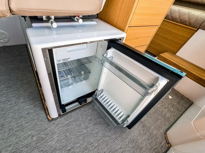  Yacht Photos Pics 2025 Axopar 37XC CROSS CABIN BRABUS Trim interior with open mini fridge.