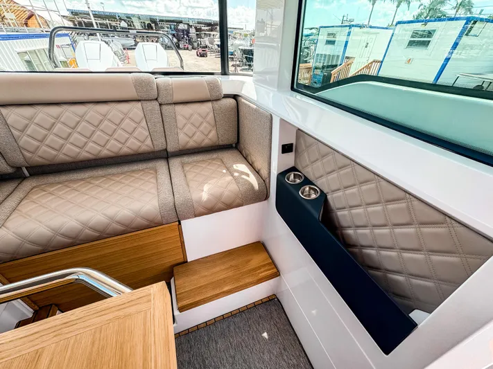  Yacht Photos Pics Interior of 2025 Axopar 37XC CROSS CABIN BRABUS Trim with quilted seating and cup holders.