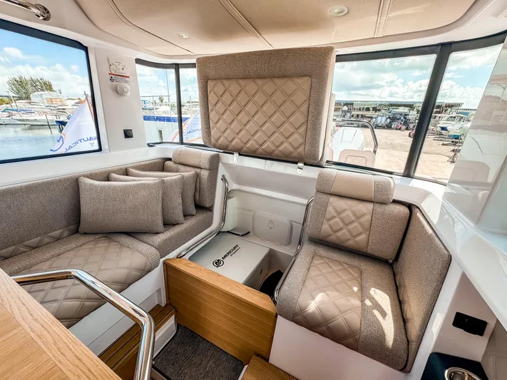  Yacht Photos Pics Luxurious interior of 2025 Axopar 37XC CROSS CABIN BRABUS Trim with quilted seating.