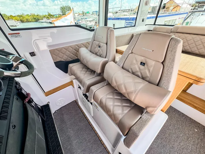  Yacht Photos Pics Luxurious interior of 2025 Axopar 37XC CROSS CABIN with BRABUS trim seating.