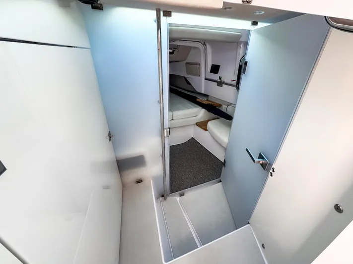  Yacht Photos Pics Interior of 2025 Axopar 37XC CROSS CABIN BRABUS Trim, featuring modern design and comfortable seating.