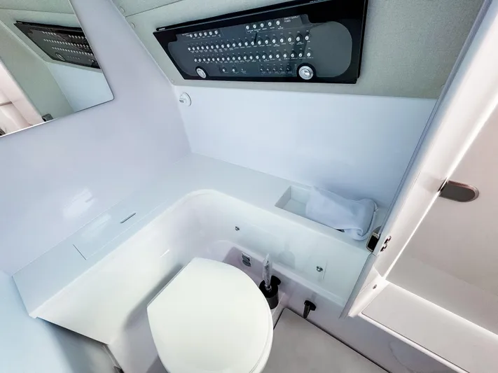  Yacht Photos Pics 2025 Axopar 37XC CROSS CABIN BRABUS Trim bathroom with modern fixtures and sleek design.