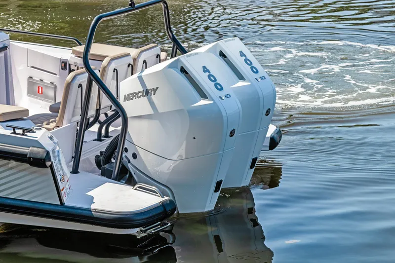  Yacht Photos Pics 2025 Axopar 37XC CROSS CABIN with dual Mercury 400 engines on water.