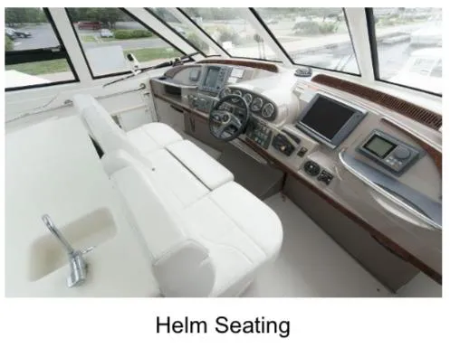  Yacht Photos Pics Helm seating area of 2000 Carver 506 Motor Yacht with modern controls and navigation displays.