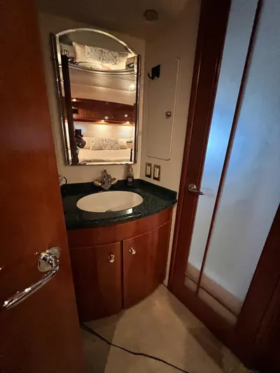  Yacht Photos Pics Bathroom interior of 2000 Carver 506 Motor Yacht with sink and mirror.
