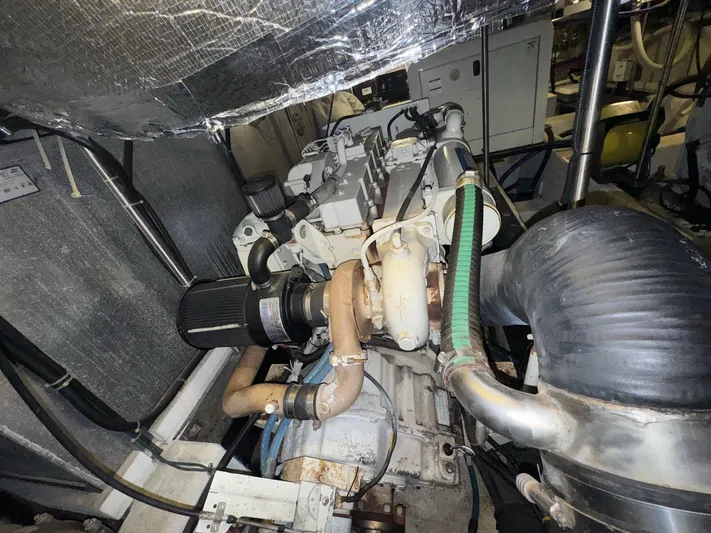  Yacht Photos Pics Engine room of 2000 Carver 506 Motor Yacht, showcasing mechanical components and piping.