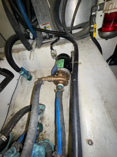  Yacht Photos Pics Engine room of 2000 Carver 506 Motor Yacht with visible hoses and components.