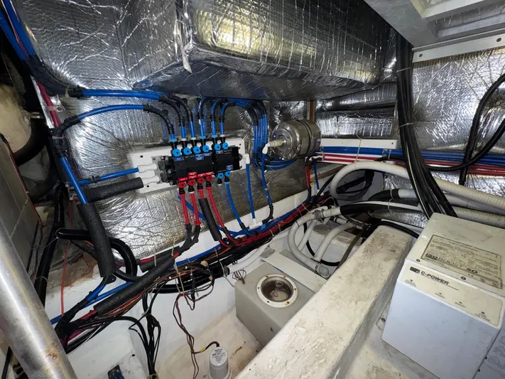  Yacht Photos Pics Engine room of a 2000 Carver 506 Motor Yacht with wiring and insulation.