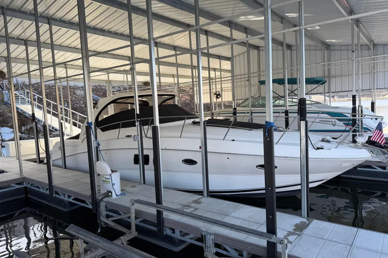  Yacht Photos Pics 2008 Sea Ray 38 Sundancer docked in a covered marina slip.