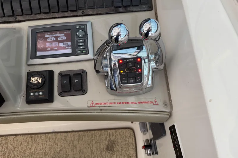  Yacht Photos Pics Control panel of a 2008 Sea Ray 38 Sundancer boat with navigation display.