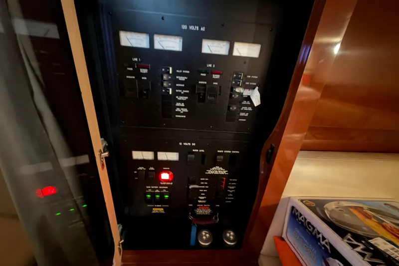  Yacht Photos Pics Electrical panel inside 2008 Sea Ray 38 Sundancer yacht, featuring various switches and meters.