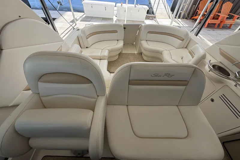  Yacht Photos Pics Luxurious interior of 2008 Sea Ray 38 Sundancer yacht with plush seating.