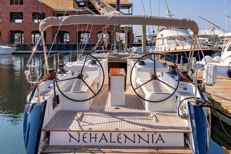 Nehalennia Yacht Photos Pics Nautor Swan 54 sailboat, 2018 model, docked at marina with dual steering wheels.