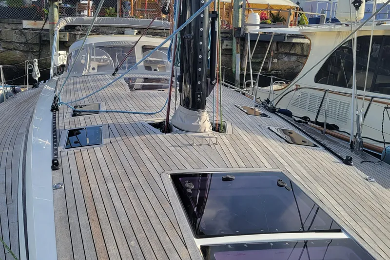 Nehalennia Yacht Photos Pics Deck view of 2018 Nautor Swan 54 yacht, showcasing sleek design and modern features.