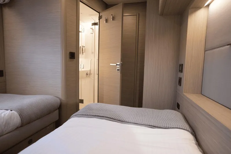  Yacht Photos Pics Luxurious interior cabin of 2025 Lagoon 60 yacht with modern design.