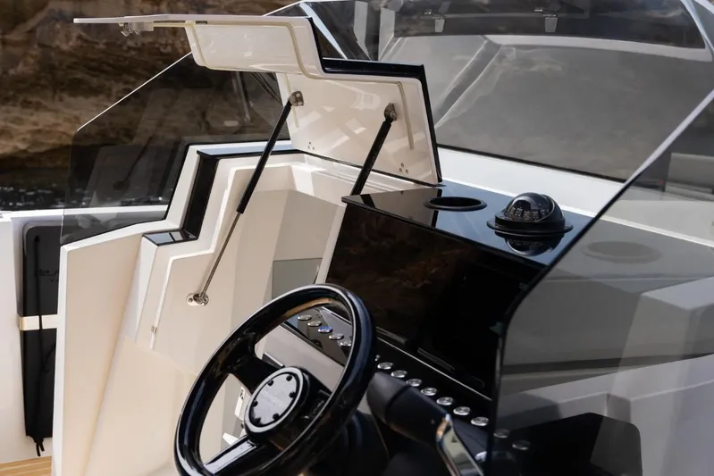  Yacht Photos Pics Helm of 2026 De Antonio Yachts D29, featuring sleek design and modern controls.