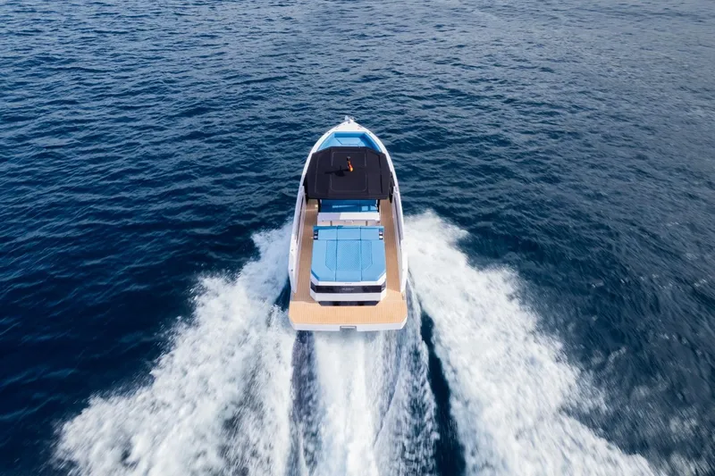  Yacht Photos Pics 2026 De Antonio Yachts D29 cruising on open water, aerial view.