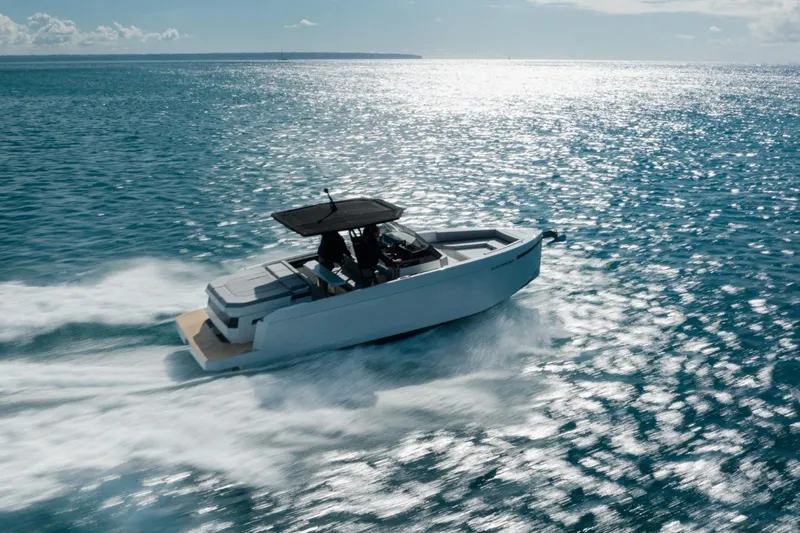  Yacht Photos Pics 2026 De Antonio Yachts D29 cruising on open sea under clear skies.