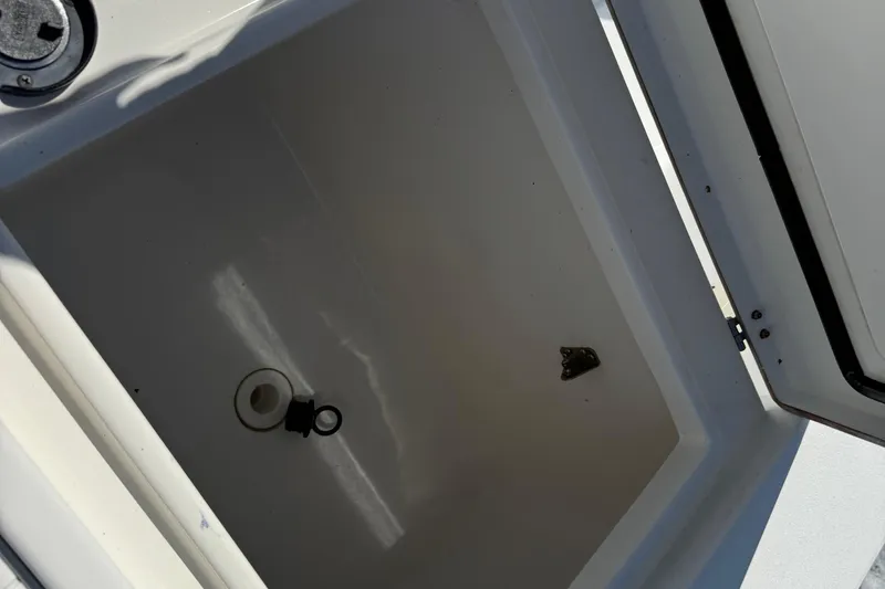  Yacht Photos Pics Open storage compartment on 2001 Regulator 32 Center Console boat.