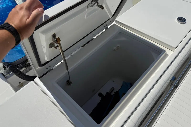  Yacht Photos Pics Open storage compartment on 2001 Regulator 32 Center Console boat.