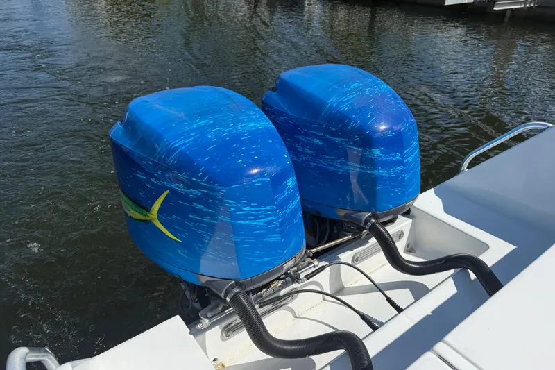  Yacht Photos Pics Twin blue outboard motors on a 2001 Regulator 32 Center Console boat.