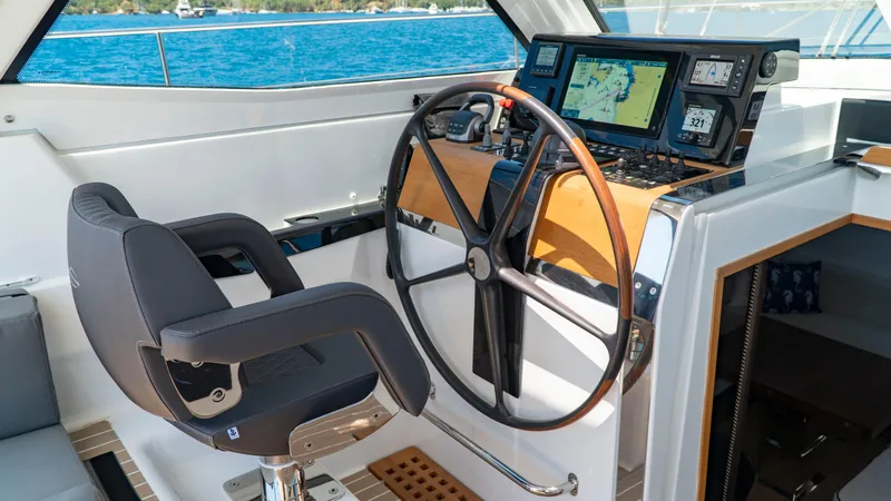  Yacht Photos Pics Amel 60 yacht helm, 2021 model, featuring modern navigation system.