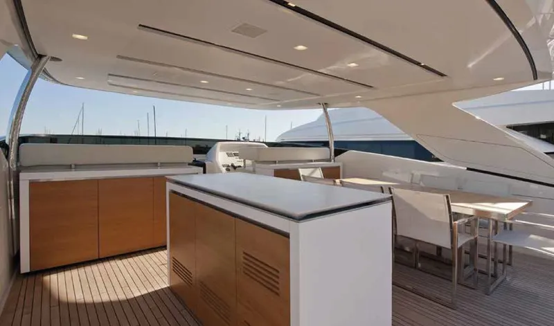 Yacht Photos Pics Luxurious 2016 Sanlorenzo SL96 yacht deck with modern dining area and sleek design.